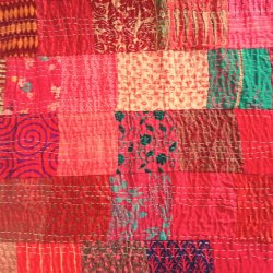 Quiltet sengetppe Warm Red